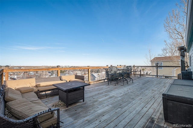 wooden deck featuring an outdoor hangout area