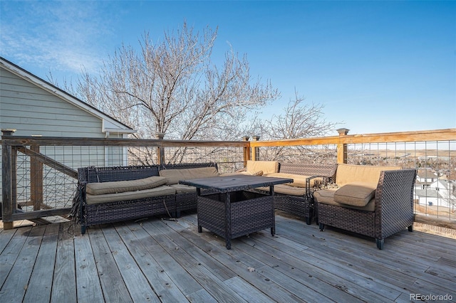 deck featuring outdoor lounge area