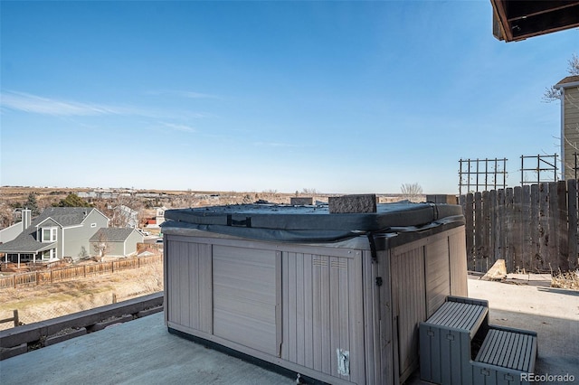 view of outdoor structure with a hot tub