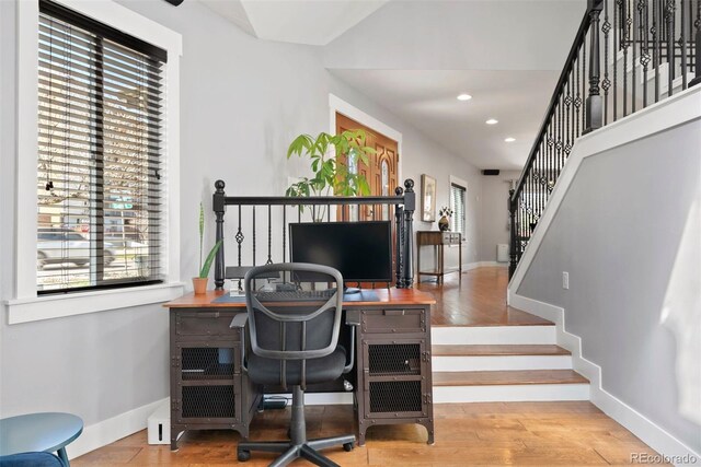 office space with recessed lighting, baseboards, and wood finished floors