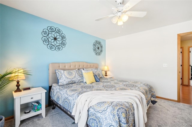 bedroom with ceiling fan and carpet