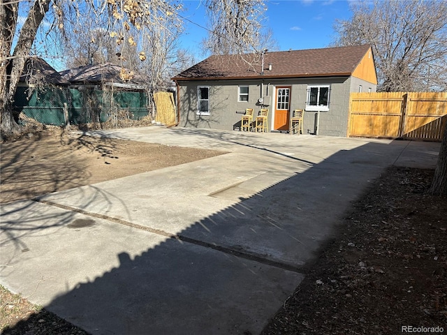 rear view of house featuring a patio area