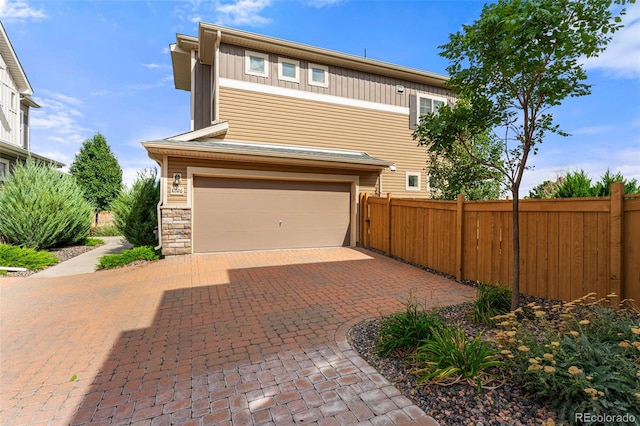 view of front of property featuring a garage