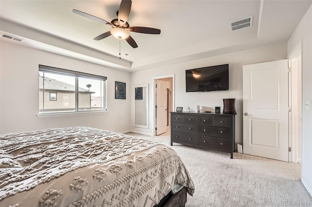 25128 E Maple Ave, Aurora, CO 80018 - bedroom with a raised ceiling, carpet floors, baseboards, and a ceiling fan