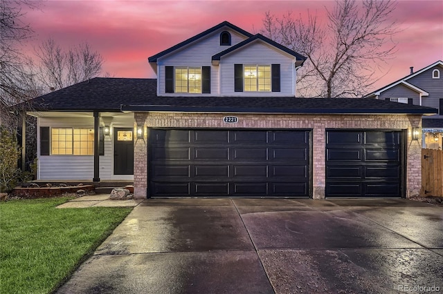 view of front of property featuring a garage