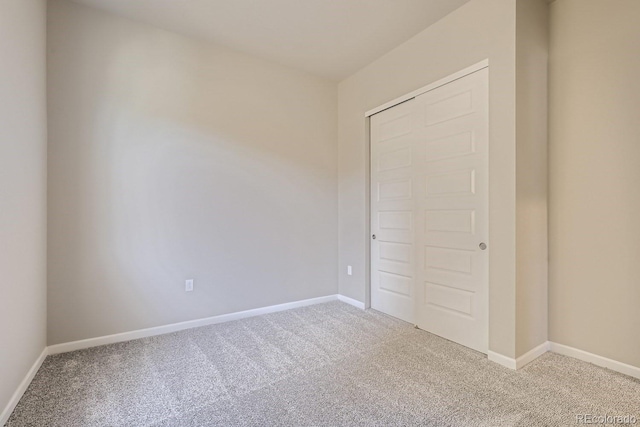 unfurnished room with carpet