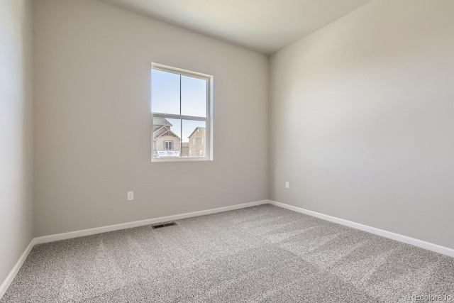 view of carpeted spare room