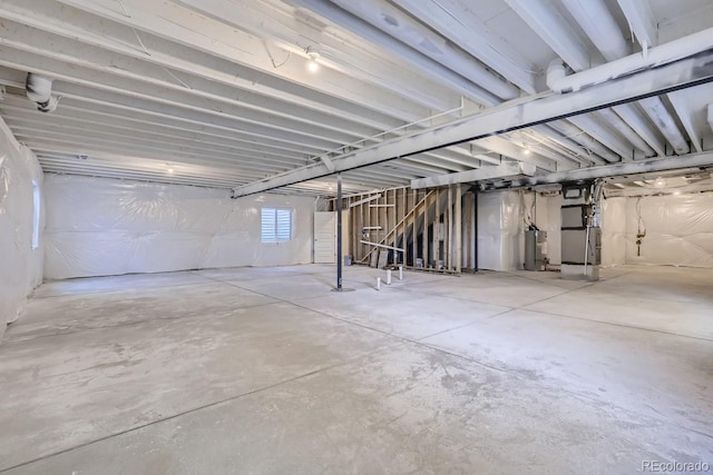 basement with heating unit and water heater