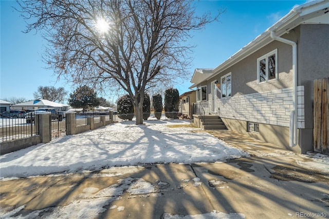 exterior space with fence private yard and a residential view