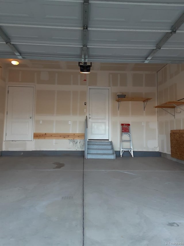 1211 Bistre St, Longmont, CO 80501 - garage with a garage door opener