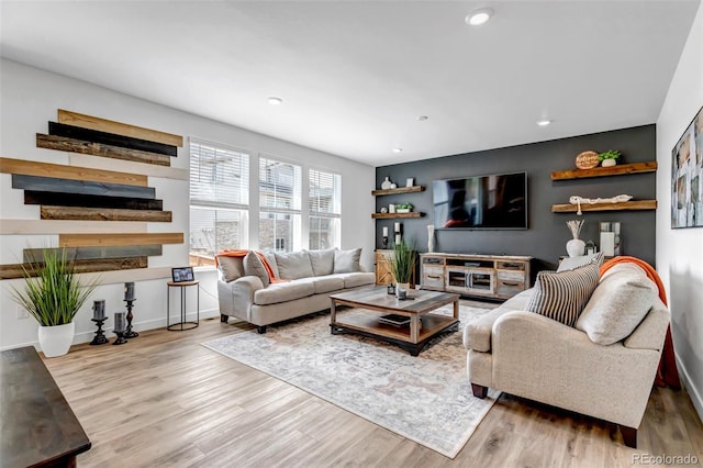 living room with baseboards, a fireplace, recessed lighting, and wood finished floors