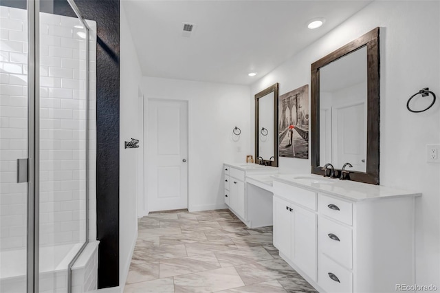 bathroom with an enclosed shower, two vanities, a sink, marble finish floor, and recessed lighting