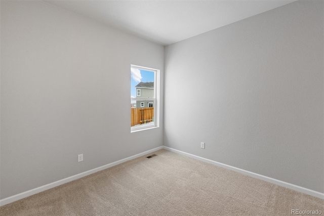 view of carpeted spare room