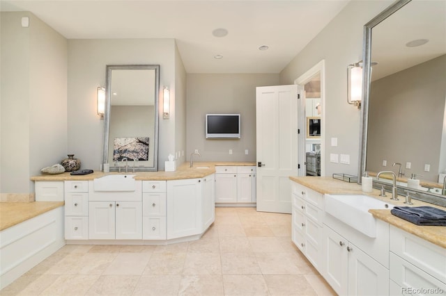 5425 S University Blvd, Greenwood Village, CO 80121 - bathroom with a sink and tile patterned floors