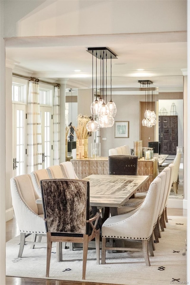 5425 S University Blvd, Greenwood Village, CO 80121 - dining area with baseboards, ornamental molding, and a chandelier