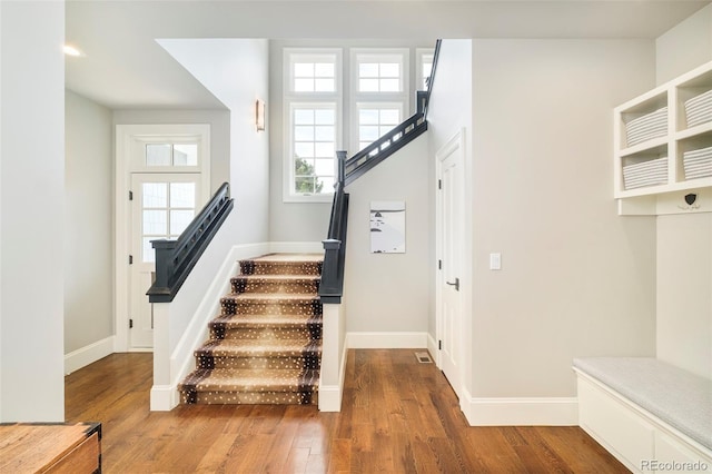 5425 S University Blvd, Greenwood Village, CO 80121 - staircase with wood finished floors and baseboards