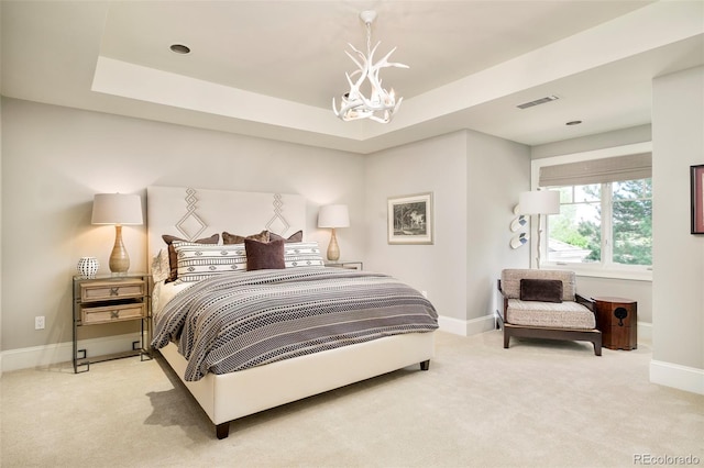 5425 S University Blvd, Greenwood Village, CO 80121 - bedroom with light carpet, a chandelier, baseboards, and a raised ceiling