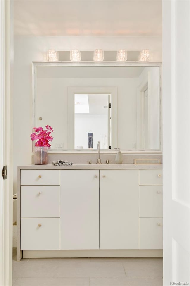 5425 S University Blvd, Greenwood Village, CO 80121 - bathroom with vanity and tile patterned floors