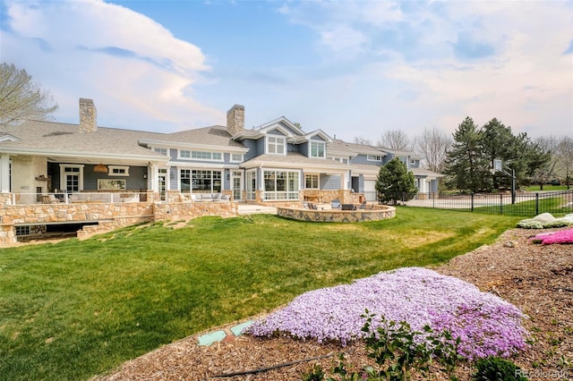 5425 S University Blvd, Greenwood Village, CO 80121 - rear view of property featuring a chimney, a patio area, and stone siding