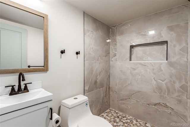 4714 S Simms Ct, Morrison, CO 80465 - full bathroom featuring vanity and tiled shower