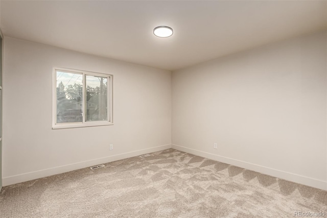4714 S Simms Ct, Morrison, CO 80465 - unfurnished room with light carpet and baseboards