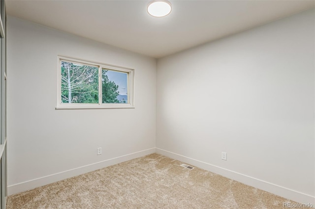 4714 S Simms Ct, Morrison, CO 80465 - spare room featuring carpet flooring and baseboards