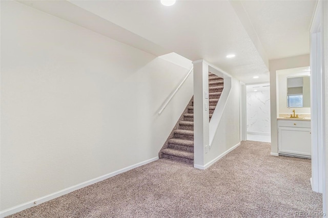 18751 E Mexico Ave, Aurora, CO 80017 - stairway with carpet floors and recessed lighting