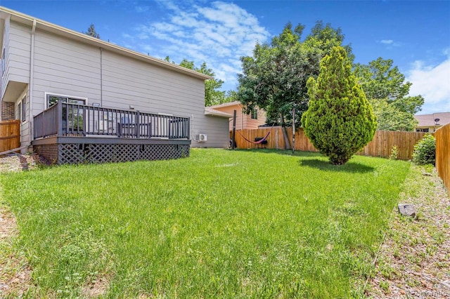 18751 E Mexico Ave, Aurora, CO 80017 - fenced backyard featuring a wooden deck