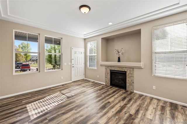 8216 Mahogany Wood Ct, Colorado Springs, CO 80927 - unfurnished living room with wood finished floors, baseboards, a fireplace, and recessed lighting