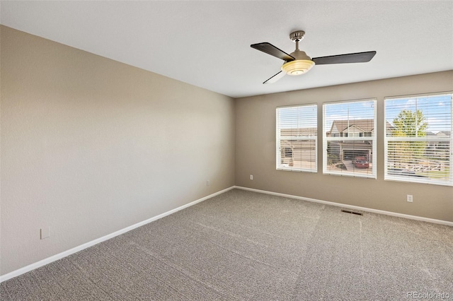 8216 Mahogany Wood Ct, Colorado Springs, CO 80927 - unfurnished room with ceiling fan, baseboards, and carpet flooring