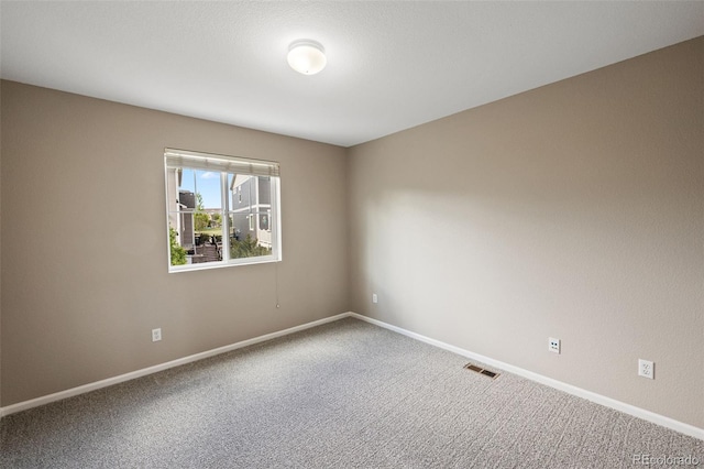 8216 Mahogany Wood Ct, Colorado Springs, CO 80927 - spare room featuring carpet floors and baseboards