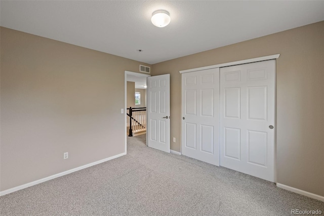 8216 Mahogany Wood Ct, Colorado Springs, CO 80927 - unfurnished bedroom with carpet, baseboards, and a closet