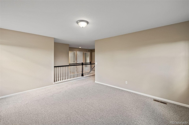 8216 Mahogany Wood Ct, Colorado Springs, CO 80927 - spare room featuring carpet and baseboards