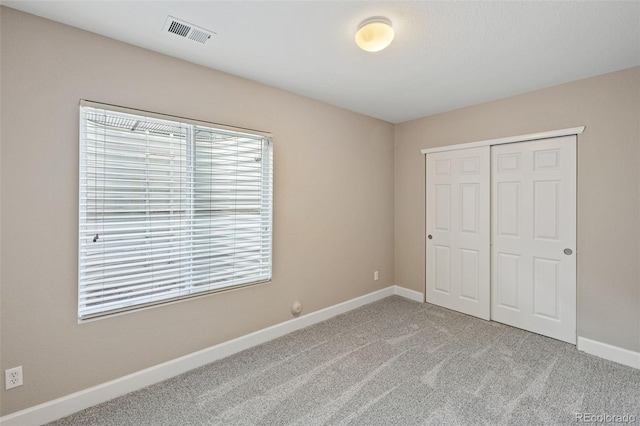8216 Mahogany Wood Ct, Colorado Springs, CO 80927 - unfurnished bedroom featuring carpet, baseboards, and a closet