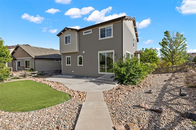 8216 Mahogany Wood Ct, Colorado Springs, CO 80927 - back of house with a patio