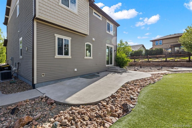 8216 Mahogany Wood Ct, Colorado Springs, CO 80927 - back of property featuring a patio area and cooling unit