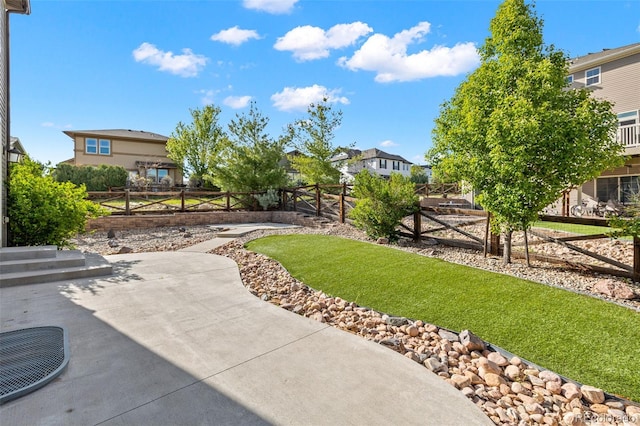 8216 Mahogany Wood Ct, Colorado Springs, CO 80927 - view of yard with a patio and a residential view