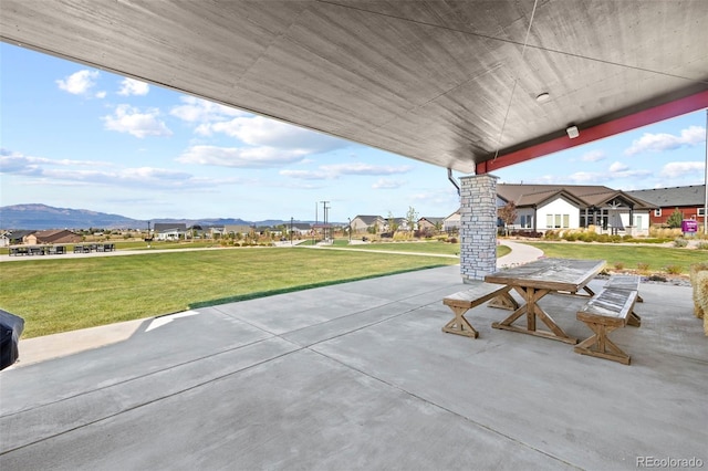 8216 Mahogany Wood Ct, Colorado Springs, CO 80927 - view of patio / terrace with a mountain view and a residential view