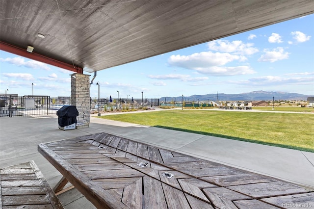 8216 Mahogany Wood Ct, Colorado Springs, CO 80927 - view of patio / terrace featuring a mountain view and a grill