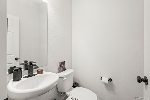 10226 Worchester St, Commerce City, CO 80022 - bathroom with a sink and toilet