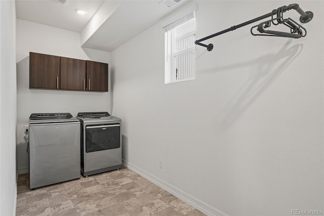 10226 Worchester St, Commerce City, CO 80022 - laundry area with washer and dryer, baseboards, and cabinet space