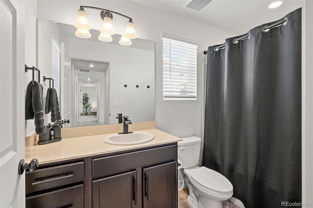10226 Worchester St, Commerce City, CO 80022 - full bath featuring toilet, vanity, visible vents, and a shower with curtain