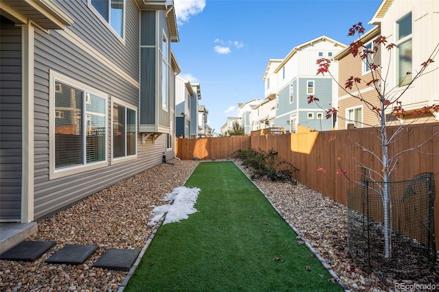 10226 Worchester St, Commerce City, CO 80022 - view of yard with a fenced backyard and a residential view