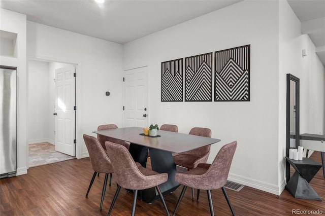 10226 Worchester St, Commerce City, CO 80022 - dining space featuring baseboards, dark wood-style floors, and visible vents