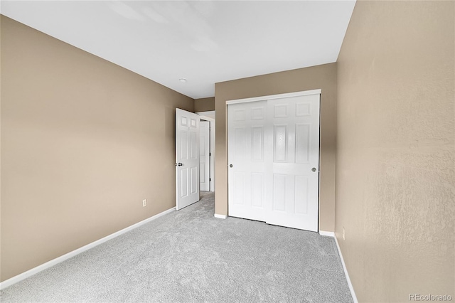 10571 Garfield St, Thornton, CO 80233 - unfurnished bedroom featuring baseboards, carpet floors, and a closet