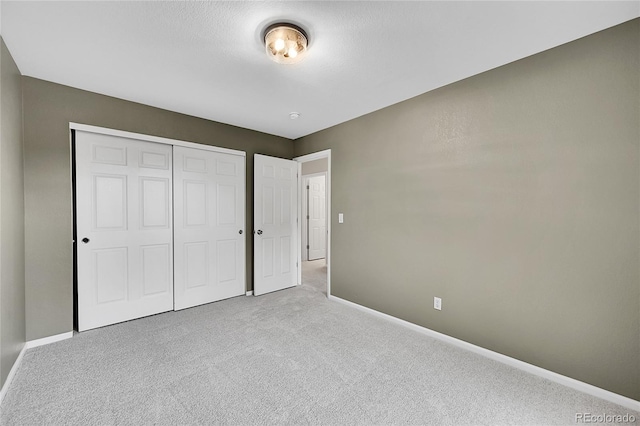 10571 Garfield St, Thornton, CO 80233 - unfurnished bedroom featuring carpet floors, baseboards, and a closet