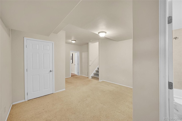 10571 Garfield St, Thornton, CO 80233 - spare room featuring carpet floors, baseboards, and stairs