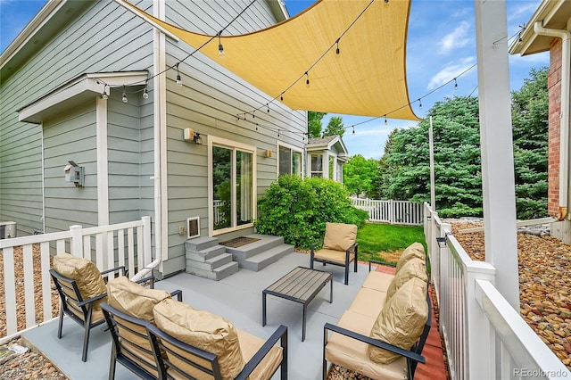 10571 Garfield St, Thornton, CO 80233 - view of patio / terrace with an outdoor living space, central air condition unit, and entry steps