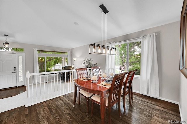 10571 Garfield St, Thornton, CO 80233 - dining room with plenty of natural light, dark wood-style flooring, and baseboards