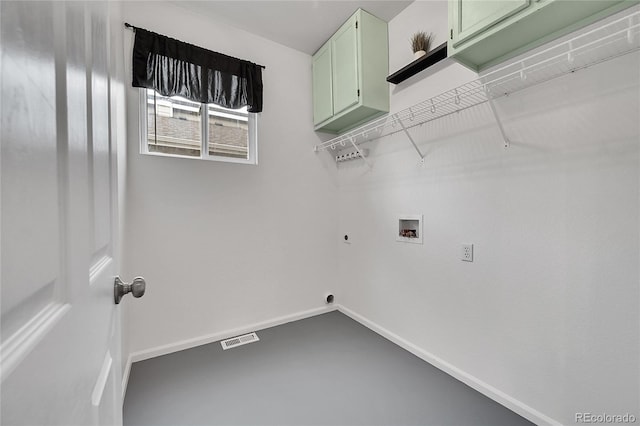 10571 Garfield St, Thornton, CO 80233 - washroom featuring cabinet space, hookup for a washing machine, baseboards, and hookup for an electric dryer